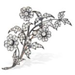 AN ANTIQUE DIAMOND SPRAY BROOCH in yellow gold and silver, designed as a floral spray, the flowers