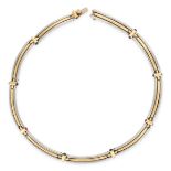 BULGARI, A VINTAGE RUBY, SAPPHIRE AND EMERALD COLLAR NECKLACE in 18ct yellow gold and silver,