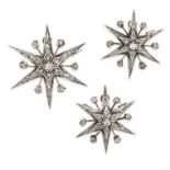 AN ANTIQUE DIAMOND STAR BROOCH / PENDANT SUITE in yellow gold and silver, comprising three six rayed