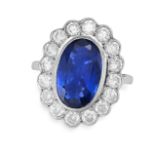 A FINE SAPPHIRE AND DIAMOND CLUSTER RING in 18ct white gold, set with an oval cut sapphire of 4.11