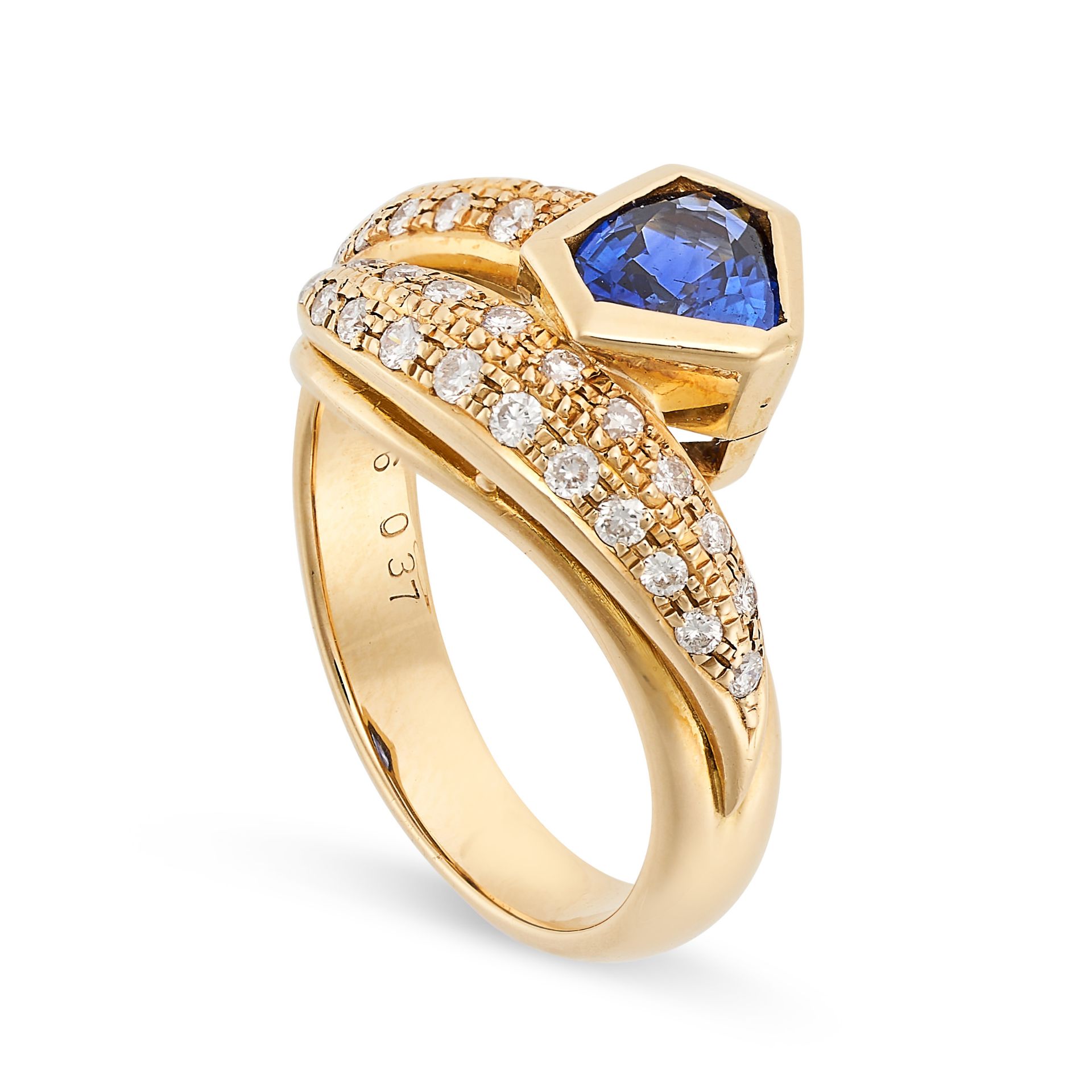 A SAPPHIRE AND DIAMOND CROSSOVER RING in 18ct yellow gold, set with a shield shaped sapphire of 0.76 - Image 2 of 2