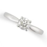 A SOLITAIRE DIAMOND RING in platinum, set with a round brilliant cut diamond of 0.74 carats, full