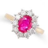 A RUBY AND DIAMOND CLUSTER RING in 18ct yellow gold, set with an oval cut ruby of 1.20 carats in a