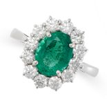 AN EMERALD AND DIAMOND CLUSTER RING in platinum, set with an oval cut emerald of 1.87 carats, in a