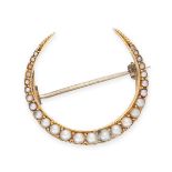 AN ANTIQUE PEARL CRESCENT BROOCH in yellow gold, designed as a crescent moon set with a row of