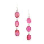 A PAIR OF GLASS FILLED RUBY DROP EARRINGS each set with three cushion cut glass filled rubies,