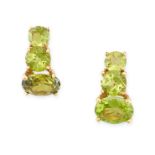 A PAIR OF PERIDOT EARRINGS in 18ct yellow gold, each set with two round and an oval cut peridot,