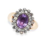 AN ANTIQUE AMETHYST AND DIAMOND RING, 19TH CENTURY in yellow gold and silver, set with an oval cut