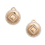 A PAIR OF DIAMOND CLIP EARRINGS in 18ct rose gold, the circular faces with a pyramid centre,