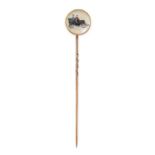 AN ANTIQUE ESSEX CRYSTAL TIE / STICK PIN in yellow gold, set with a circular reverse carved intaglio