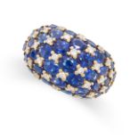 A SAPPHIRE AND DIAMOND BOMBE RING in 18ct yellow gold, the domed face set with round cut sapphires
