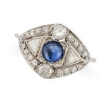 AN ART DECO SAPPHIRE AND DIAMOND DRESS RING in platinum, the tapering face set with a cabochon