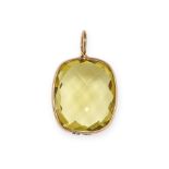 A GREEN TOPAZ PENDANT in 14ct yellow gold, set with a cushion shaped faceted green topaz, stamped