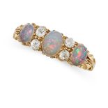 AN ANTIQUE OPAL AND DIAMOND RING in yellow gold, set with three cabochon opals punctuated by pairs