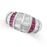 A RUBY AND DIAMOND BOMBE RING in platinum, the domed face set with tapered baguette cut diamonds