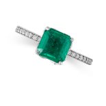 AN EMERALD AND DIAMOND RING in 14ct white gold, set with an octagonal step cut emerald of 1.87