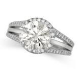 A SOLITAIRE DIAMOND ENGAGEMENT RING in platinum, set with a round brilliant cut diamond of