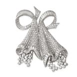 A VINTAGE DIAMOND DOUBLE CLIP BROOCH in platinum and white gold, designed as a stylised bow
