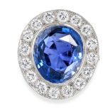A CEYLON NO HEAT SAPPHIRE AND DIAMOND CLUSTER RING set with an oval cut blue sapphire of 14.80