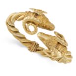 ZOLOTAS, A VINTAGE RAMS' HEAD BANGLE in 18ct yellow gold, the hinged body of twisted design,