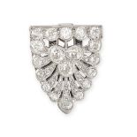 A DIAMOND CLIP BROOCH in platinum, in shield form set throughout with old cut and rose cut diamonds,