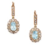 A PAIR OF AQUAMARINE AND DIAMOND DROP EARRINGS in yellow gold, each comprising a row of old cut