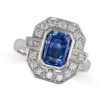 A SAPPHIRE AND DIAMOND RING in 18ct white gold, set with an octagonal step cut sapphire of 2.54