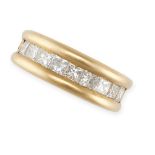 A DIAMOND BAND RING in 18ct yellow gold, set with a row of princess cut diamonds, French import