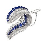 A VINTAGE BURMA NO HEAT SAPPHIRE AND DIAMOND BROOCH in platinum and 18ct white gold, the brooch