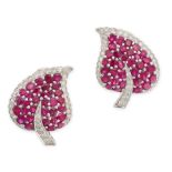 A PAIR OF RUBY AND DIAMOND LEAF EARRINGS in 18ct white gold, each designed as a leaf set with rows