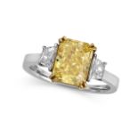 A 2.61 CARAT INTERNALLY FLAWLESS FANCY VIVID YELLOW DIAMOND RING in platinum and 18ct yellow gold,