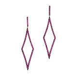 A PAIR OF RUBY DROP EARRINGS in 18ct blackened gold, designed as an elongated diamond shape set