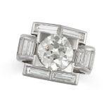 VAN CLEEF & ARPELS, A VINTAGE DIAMOND DRESS RING in platinum, the geometric face set with a