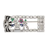 LACLOCHE FRERES, A FINE ART DECO DIAMOND, ONYX, SAPPHIRE, RUBY AND EMERALD BROOCH in platinum and