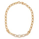 VAN CLEEF & ARPELS, A DIAMOND NECKLACE in 18ct yellow gold, comprising a row of elliptical fancy
