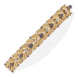 A VINTAGE SAPPHIRE AND DIAMOND BRACELET in 18ct yellow gold, in foliate design, set with a row of