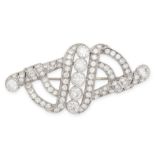 A VINTAGE DIAMOND BROOCH, CIRCA 1950 the scrolling openwork body set with seven principal old cut
