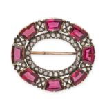 AN ANTIQUE GARNET AND DIAMOND BROOCH in yellow gold and silver, designed as an open oval set with