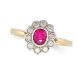 A RUBY AND DIAMOND CLUSTER RING in 18ct yellow gold, set with an oval cut ruby in a cluster of round