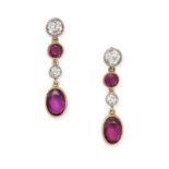 A PAIR OF RUBY AND DIAMOND DROP EARRINGS in yellow and white gold, each set with a row of