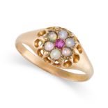 AN ANTIQUE OPAL AND RUBY CLUSTER RING in yellow gold, set with a central cushion cut ruby within a