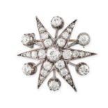 AN ANTIQUE DIAMOND STAR BROOCH in rhodium plated gold, designed as a six rayed star set throughout