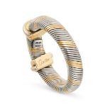 CARTIER, A VINTAGE OR ET ACIER RING in 18ct yellow gold and steel, comprising alternating sections