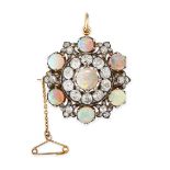 A FINE ANTIQUE VICTORIAN OPAL AND DIAMOND BROOCH / PENDANT in yellow gold and silver, set with a