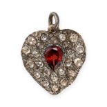 AN ANTIQUE GARNET AND DIAMOND HEART PENDANT in yellow gold and silver, designed as a heart set