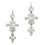 A PAIR OF DIAMOND DROP EARRINGS in white gold, set with a central old cushion cut diamond suspending