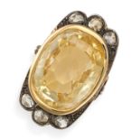 A 31.00 CARAT CEYLON NO HEAT YELLOW SAPPHIRE AND DIAMOND RING in yellow gold, set with an oval