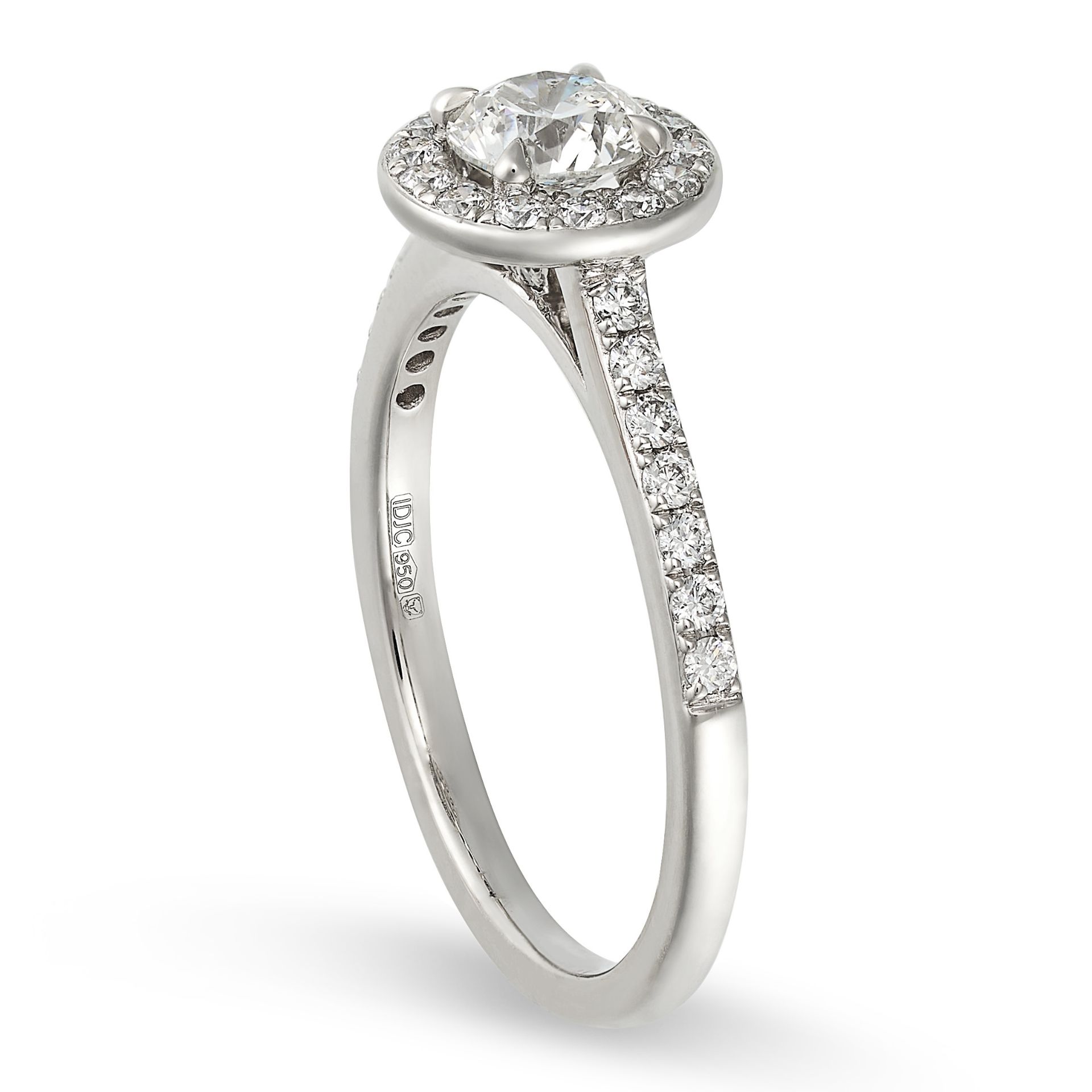 A DIAMOND CLUSTER RING in platinum, set with a round brilliant cut diamond in a border of round c... - Image 2 of 2