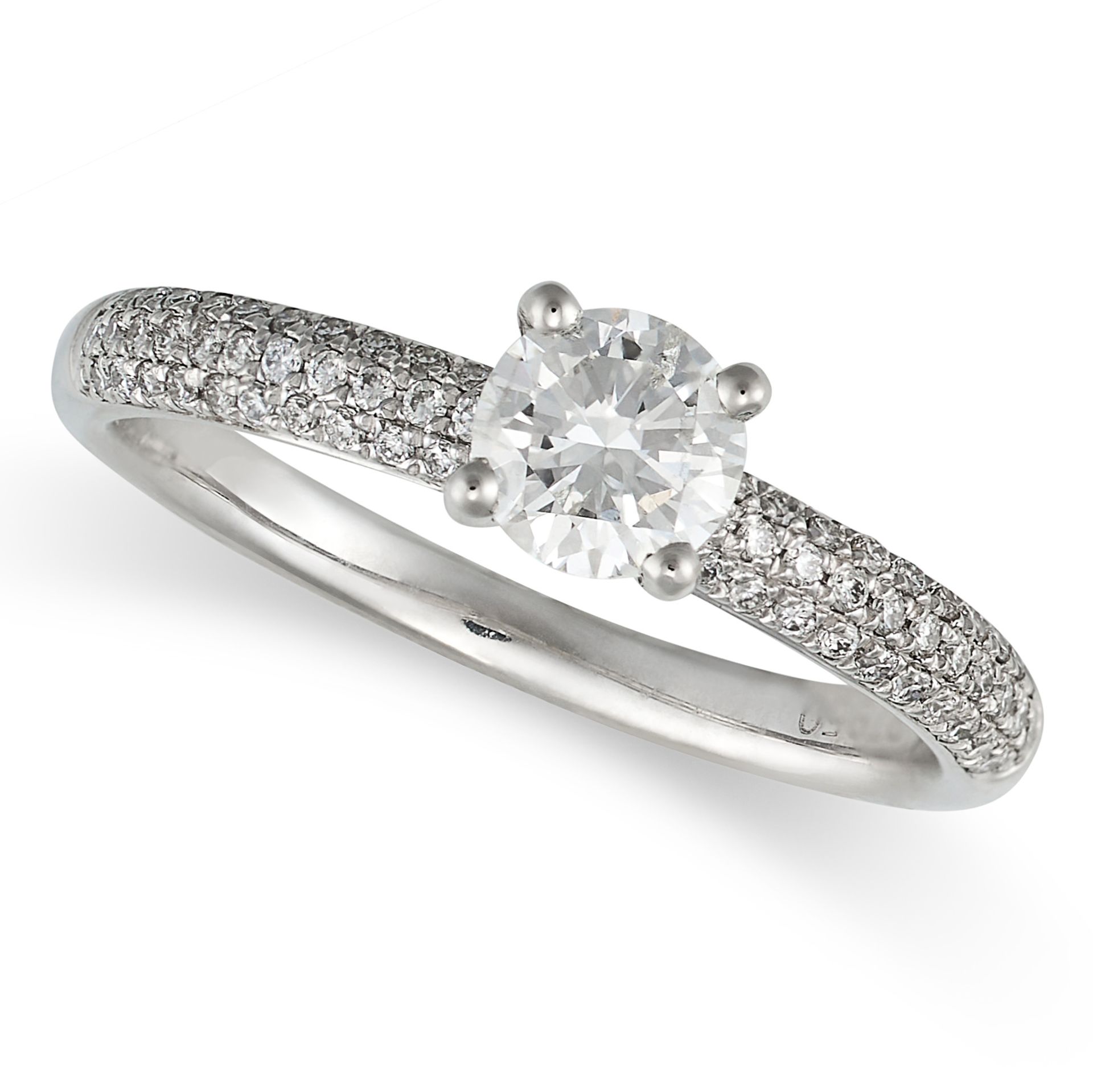 A SOLITAIRE DIAMOND ENGAGEMENT RING in platinum, set with a round brilliant cut diamond, the band...