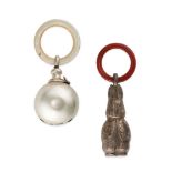 A PAIR OF TWO VINTAGE SILVER BABY RATTLES, in sterling silver, one modelled as Peter Rabbit with ...